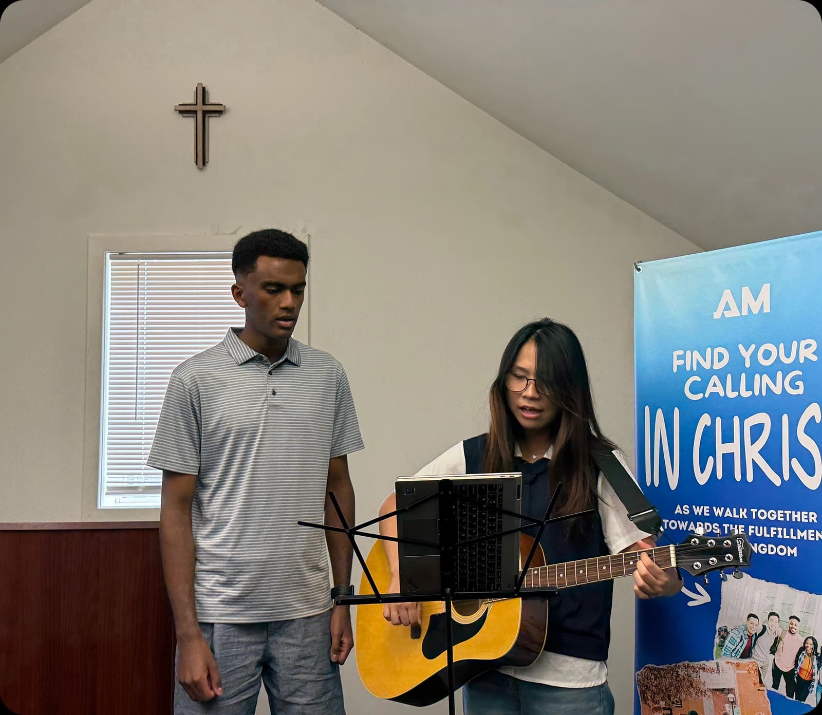 Students leading worship at an AM chapter gathering